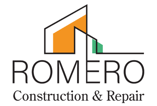 Modern house under construction with scaffolding and building materials in the background.