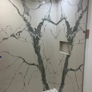 Elegant marble wall with gray veining in a modern interior space.